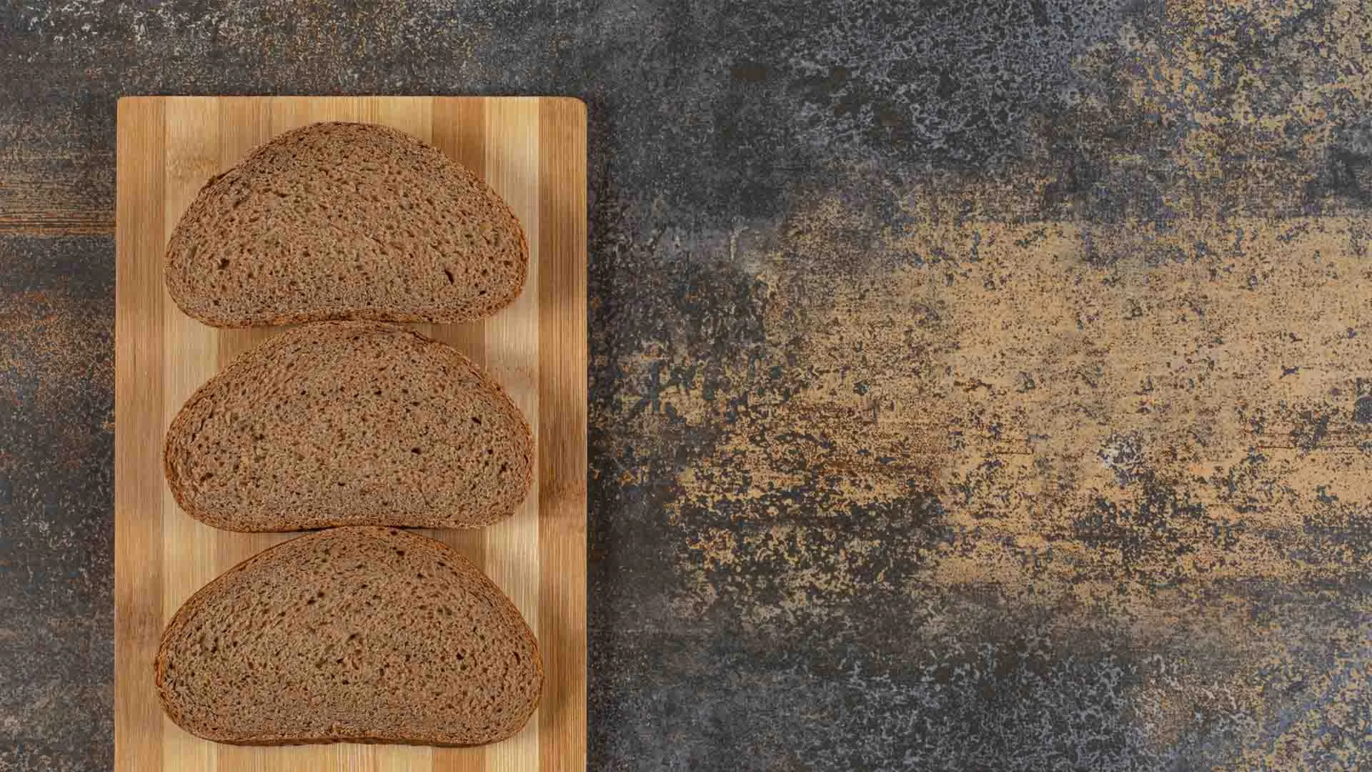 Slices of bread on a cutting board