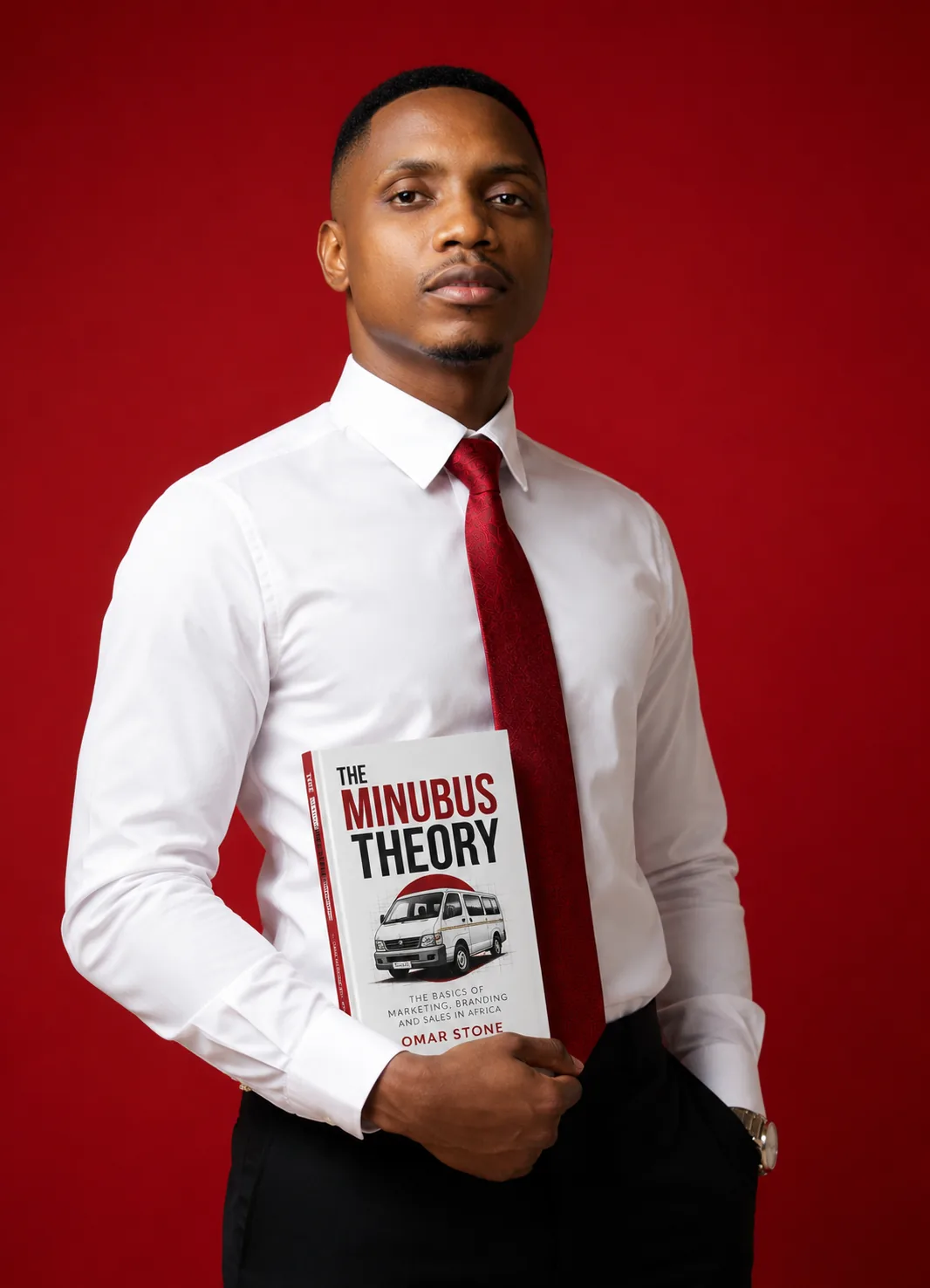 Omar Stone holding The Minibus Theory
